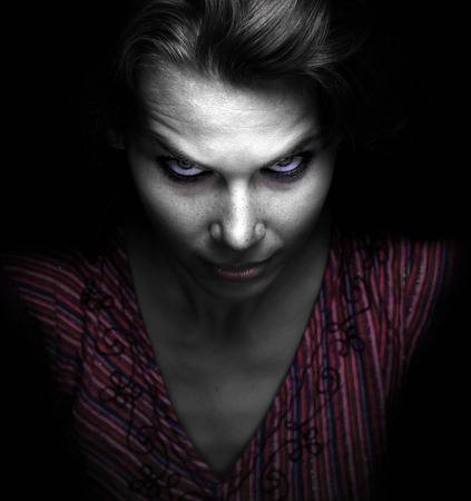 45393300-scary-spooky-evil-woman-in-the-dark copy